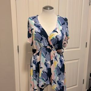 Gently used Torrid high low top needs a new home and looks great with anything.